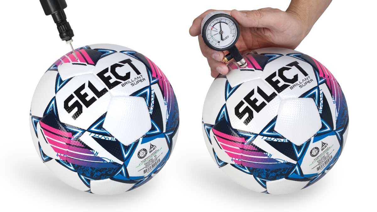 Fotballpumpe settes i ventilen på en fotball