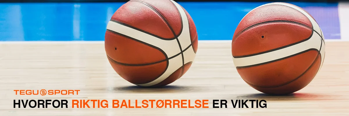 To basketballer i forskjellige størrelser liggende på en gymsal